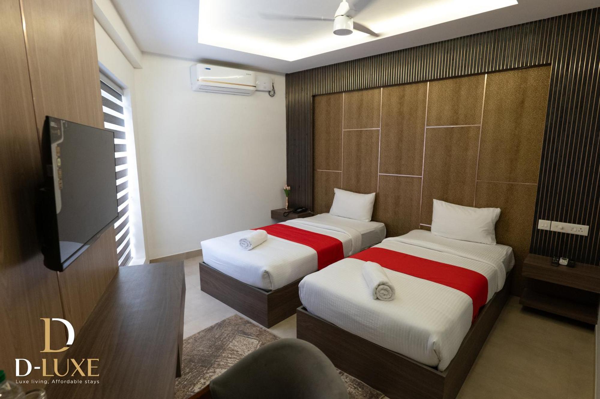 D-Luxe Hotel Kochi Bagian luar foto