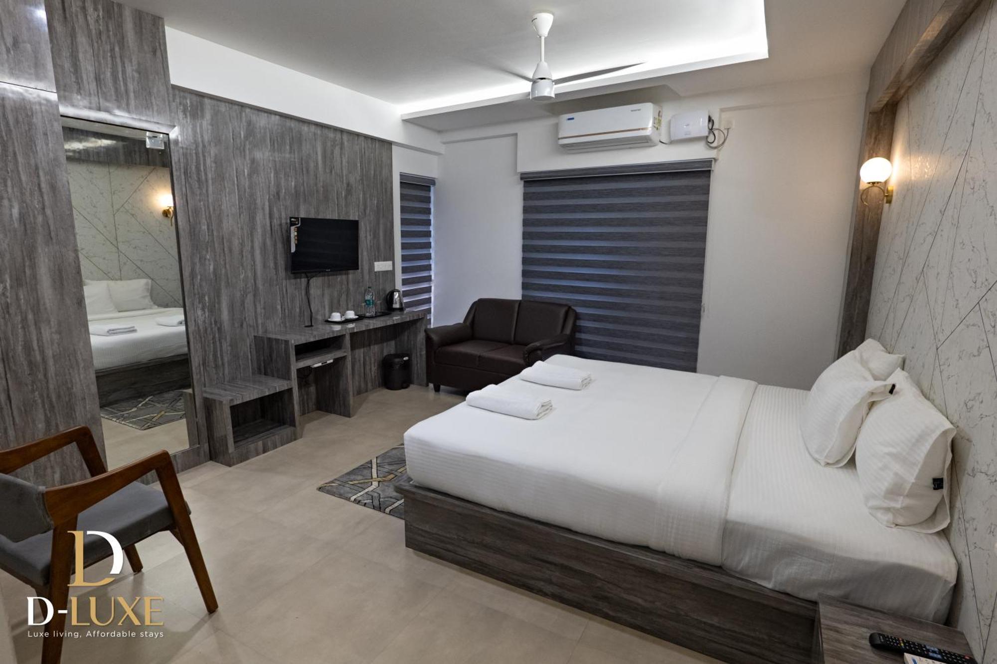 D-Luxe Hotel Kochi Bagian luar foto