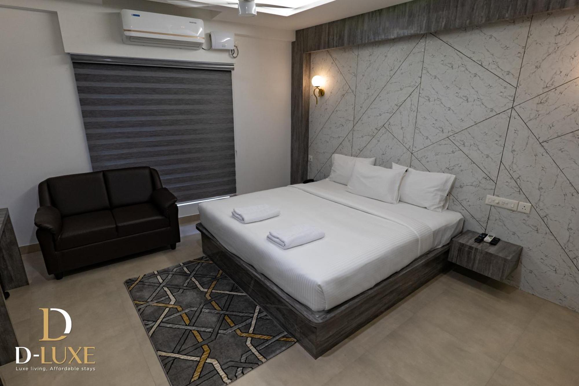 D-Luxe Hotel Kochi Bagian luar foto